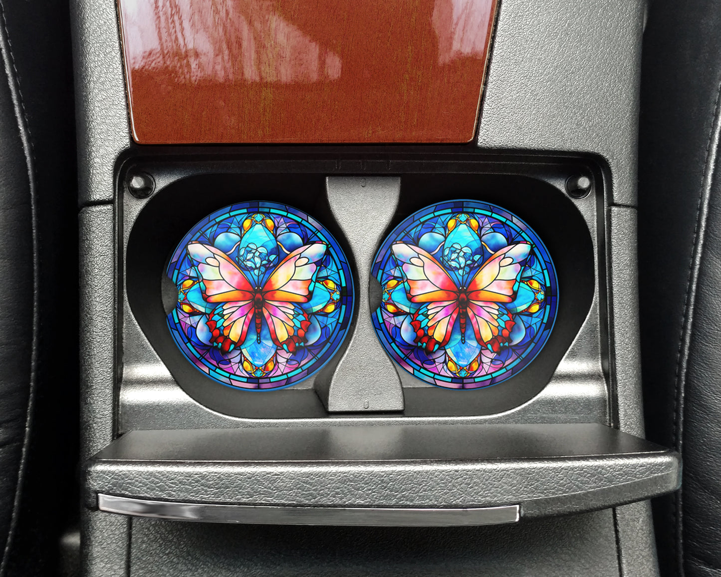 a pair of colorful butterflies on the center console of a car