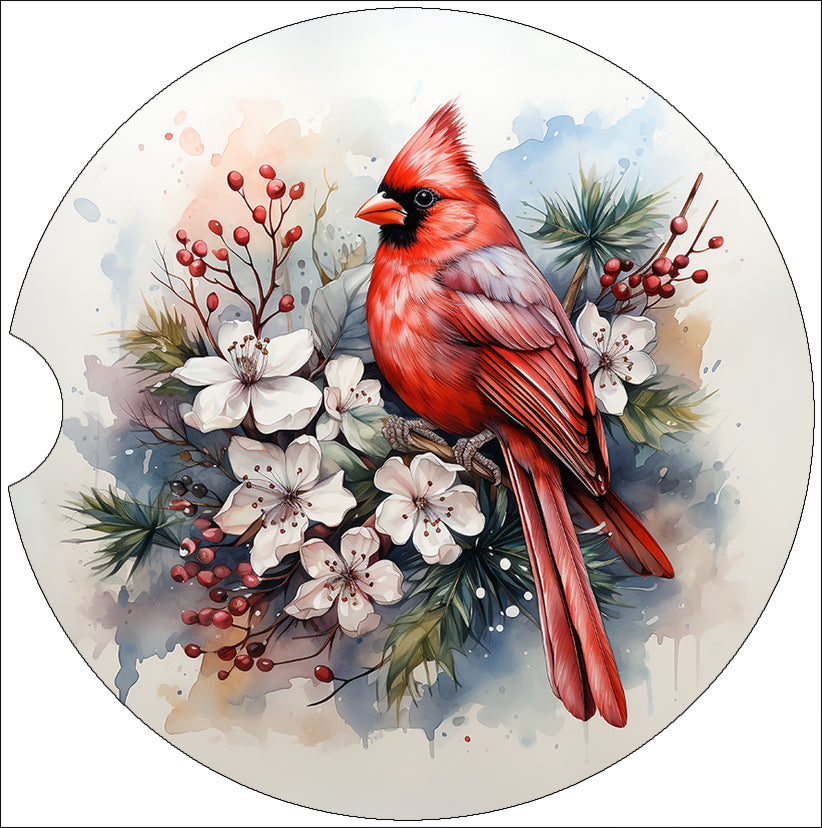 a red bird sitting on top of a branch of flowers