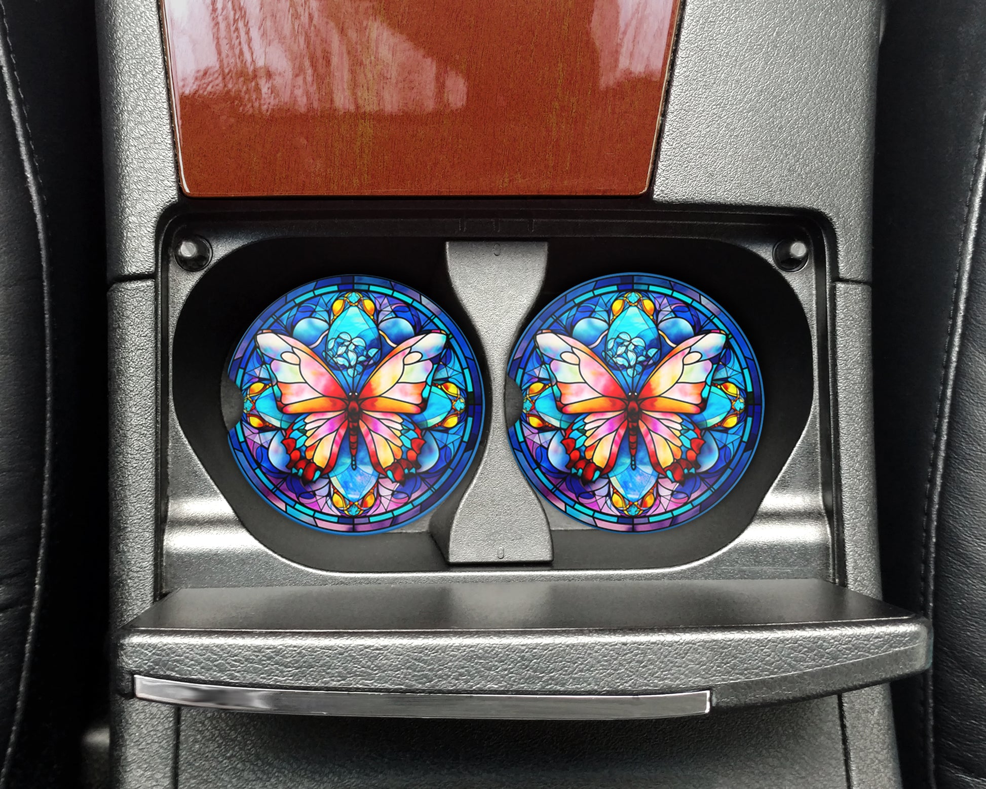 a pair of colorful butterflies on the center console of a car