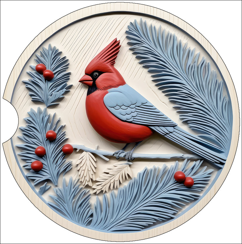 a red bird sitting on a branch of a tree