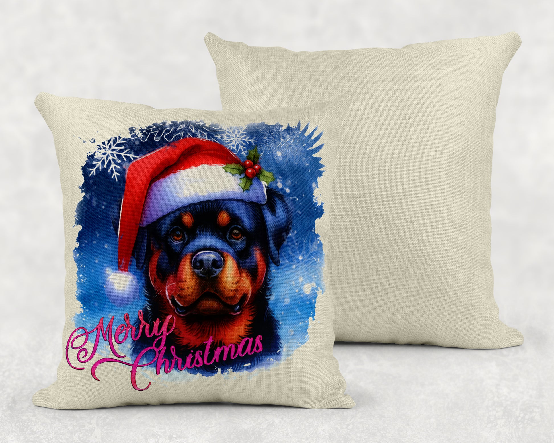 two pillows with a dog wearing a santa hat