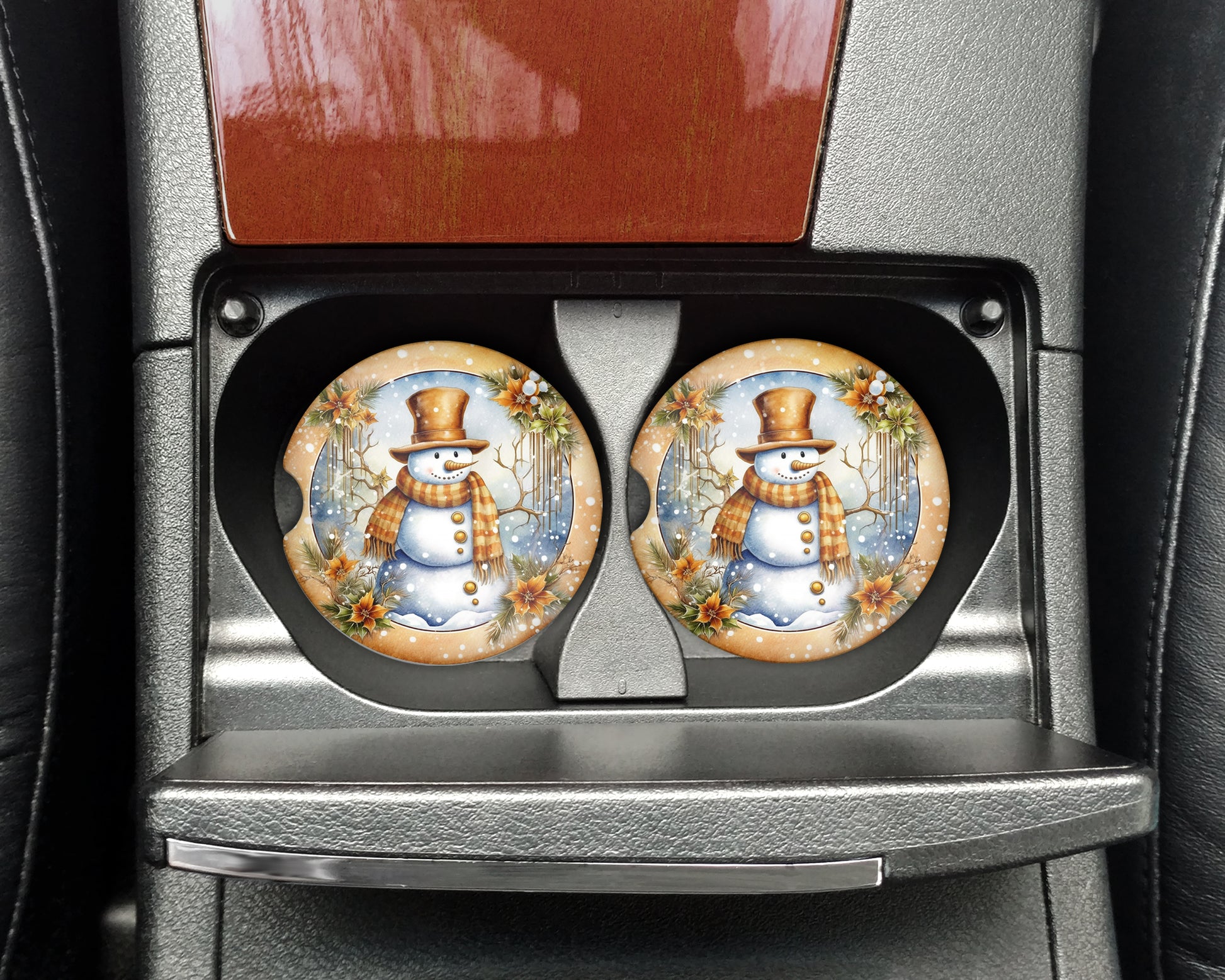 a pair of snowman plates sitting on top of a car seat