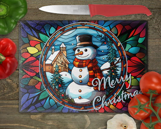 a cutting board with a picture of a snowman on it